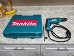 Makita HP1621F Corded Hammer Drill 1/2" W/case 110V Missing Pieces Chuck. Fixed Price $35.00.