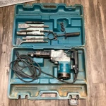 Makita Model HR3851 1-1/2" Rotary Hammer Drill W/ Case And Bits. Fixed Price $189.00.
