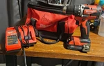 Milwaukee M18 18V Drill/driver Power Tool Set, Li-ion Battery & Charger. Fixed Price $115.00.