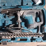 Makita HR4002 1" Rotary Hammer Drill W/ Carrying Case, Bits & Manual. Fixed Price $350.00.