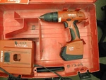 Hilti Sf 150-A Cordless Drill/driver, Battery, Charger, Case Works /smells Bad. Fixed Price $40.00.