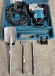 Makita HM1211B Demolition Hammer, 3/4" Hex, 10A, 2000BPM In Case W Extra Pieces. Fixed Price $599.99.