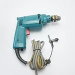 Makita 10MM Hammer Drill Model Hp 1030 Variable Speed Reversible. Fixed Price $53.95.