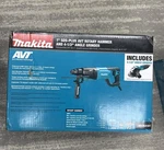 Makita HR2641X1 1" Sds Avt Rotary Hammer & 4.5" Angle Grinder Corded AO4075609. Fixed Price $157.95.