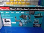 Makita Brushless Rotary Hammer Drill XRH10PTW. Fixed Price $499.99.