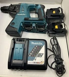 Makita 36V (18V X2) Lxt 1" Sds-plus Rotary Hammer XRH05 W/2 Batteries & Charger. Fixed Price $239.99.