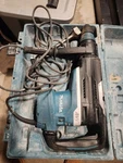 Makita HR5212C Corded Electric Rotary Hammer W/ Carrying Case. Fixed Price $400.00.
