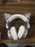 Ariana Grande Brookstone Silver Light-up Cat Ear Headphones. Fixed Price $55.00.