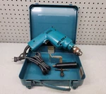 Makita NHP1030 3/8" Hammer Drill In Metal Case. Fixed Price $39.99.