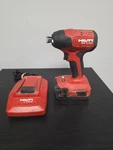 Hilti Sid 4-A22 Impact Driver Red Tool W/ Battery & Charger. Fixed Price $199.95.