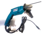 Makita 1/2" Hammer Drill, 115V, 5A, 0-2800 Rpm, Mod. HP1500 W/key, Chuck & Man.. Fixed Price $162.18.